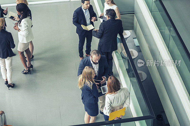 Group of business people in the office building lobby